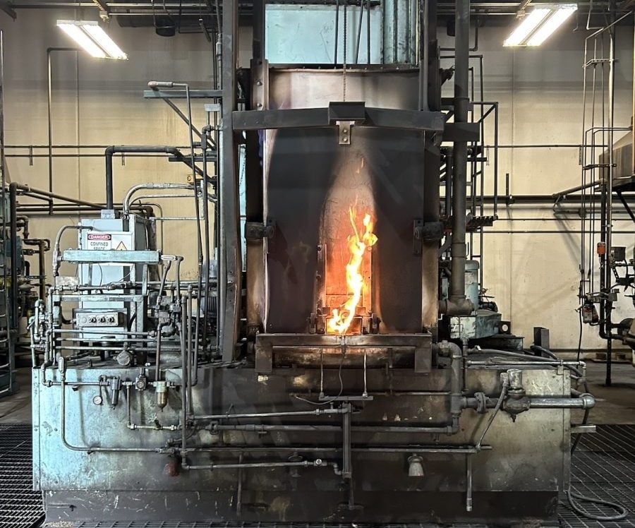 Oil hardening flame during equipment operation.